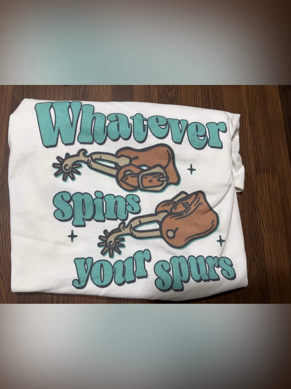 Graphic "Whatever Spins Your Spurs" Tee - Turquoise & Brown